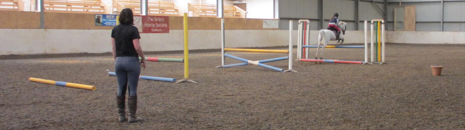 Jumping lesson at Barstobrick Indoor Arena
